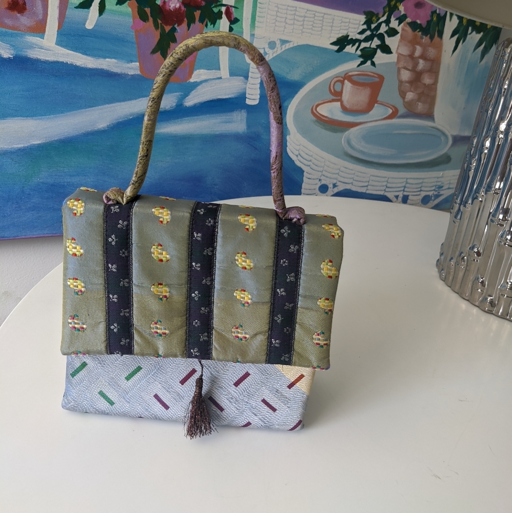 Fentio fabric handle handbag with tassel